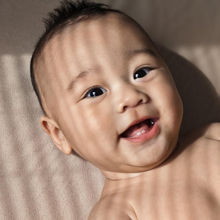 Kaveri Mehta, Lead Design Curator at SunVaultPaper, reviewing corporate floral arrangements